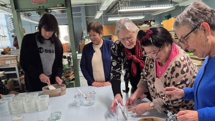 C4W_Conservation for Wellbeing participants learning to make paste.jpg 1